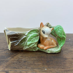 Eastgate posy trough deer on log - Fauna